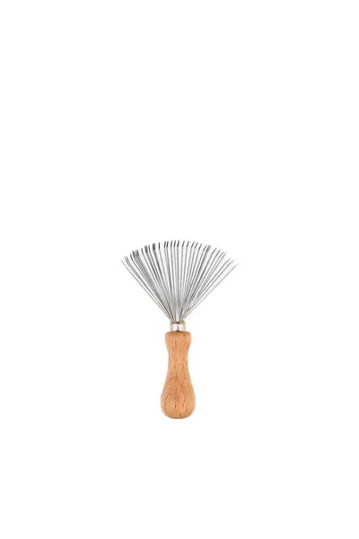 Cleaning comb for garment brush